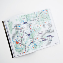 Guide, plan avec pictogramme. Bulles indicatives des buvettes en bleu indigo.