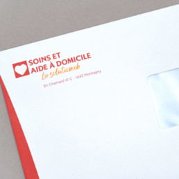 Conception graphique, enveloppe, logo la-solution.ch, Pictogramme coeur et typographie